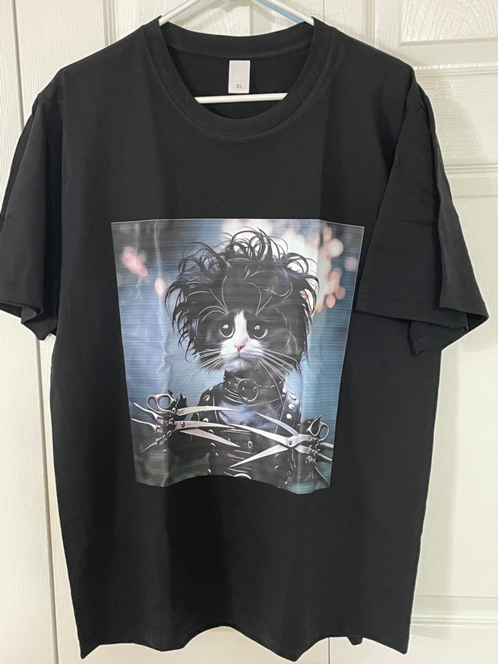 Black Cat Graphic T-Shirt Featuring Stylized Kitty